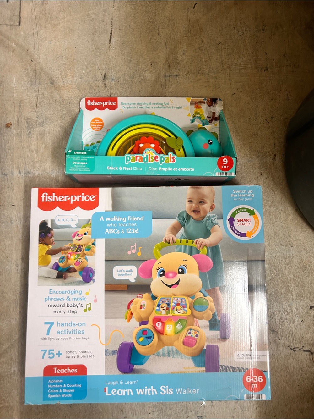 Two Fisher-Price toddler learning toys